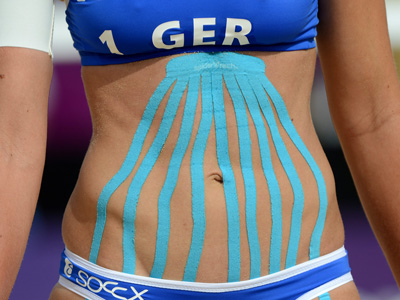 tape taping kinesio athletes colored help volleyball beach wearing stomach why olympics massage magic olympic wears katrin holtwick germany many