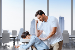 Corporate massage chair set up in an office environment for a wellness program